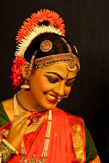 Dancer smiling in classical Kuchipudi costume